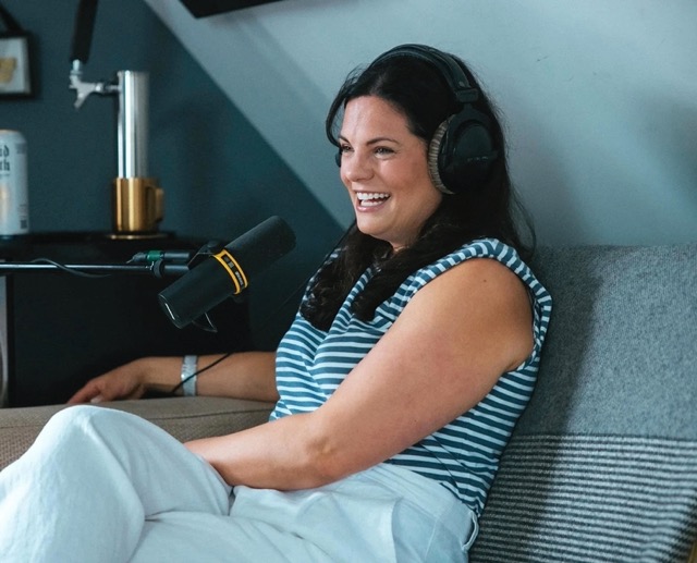 Andrea Dunlop recording a podcast.